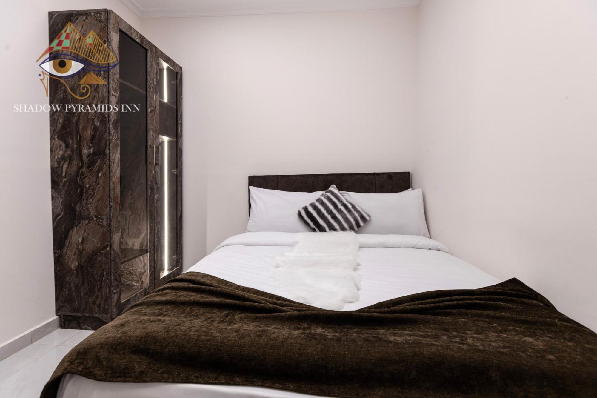 Shadow Pyramids Suites And Jacuzzi Kafret el-Gabal Exterior foto